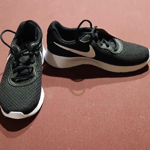 Nike Shoes - Nike Women's Black and White Sneakers NWT...retail 56.00. Size 6